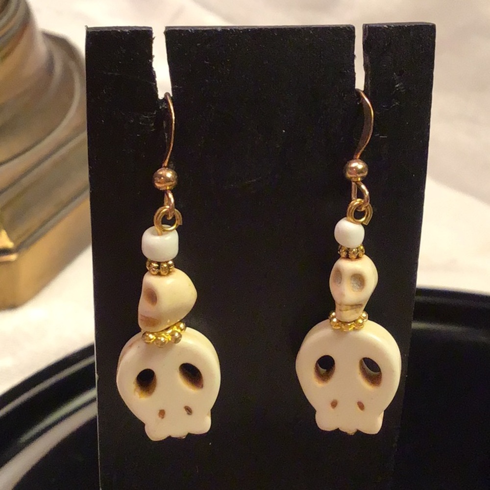 White skull earrings